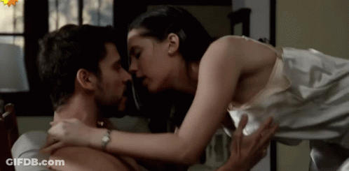 Man And Woman Kissing On Bed Woman Wearing Watch GIF