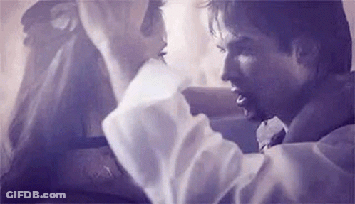 Man And Woman Kissing On Cheek GIF