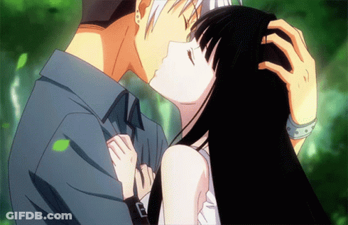 Man And Woman Kissing GIF