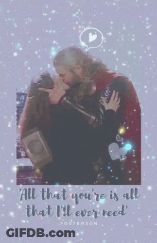Man And Woman Kissing Poster Saying All That You're Is All That I'll Ever Need GIF