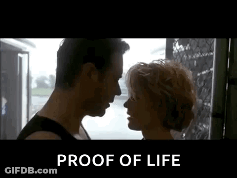 Man And Woman Kissing Proof Of Life GIF