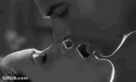 Man And Woman Kissing GIF