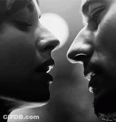 Man And Woman Kissing GIF
