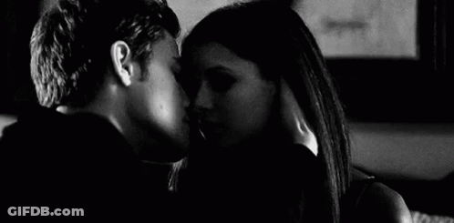 Man And Woman Kissing GIF