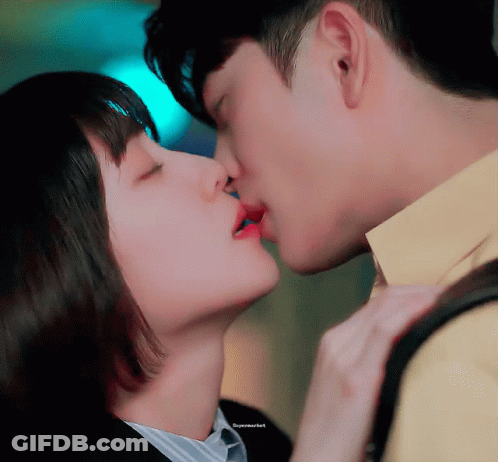 Man And Woman Kissing Supermarket GIF