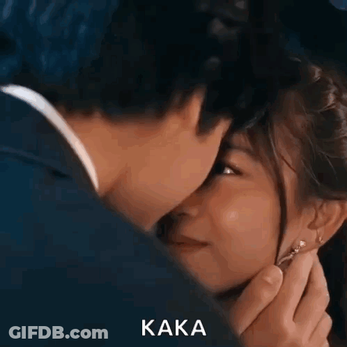 Man And Woman Kissing GIF