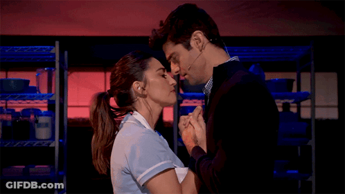 Man And Woman Kissing GIF