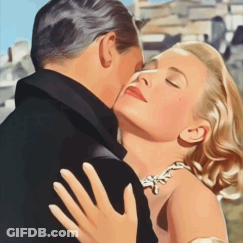 Man And Woman Kissing GIF