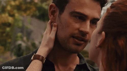 Man And Woman Kissing GIF
