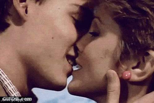 Man And Woman Kissing GIF