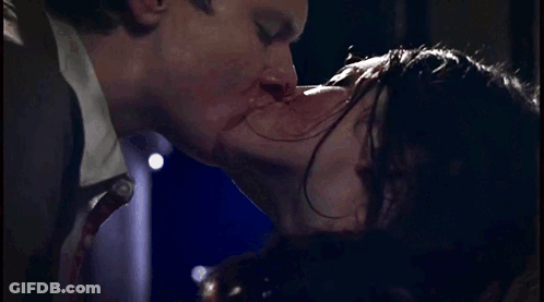 Man And Woman Kissing With Blood On Face GIF