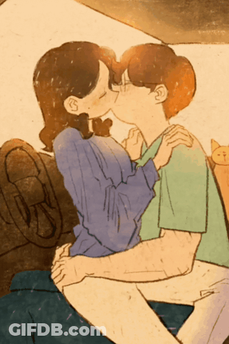 Man And Woman Kissing With Cat Behind GIF