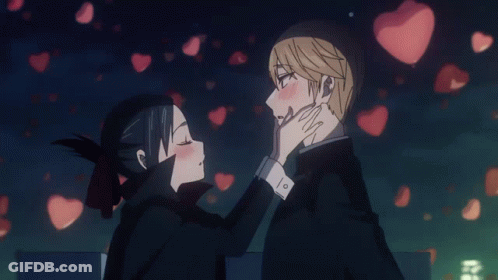 Man And Woman Kissing With Flying Hearts GIF