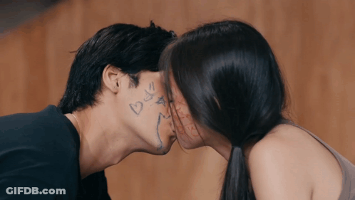 Man And Woman Kissing With Heart Face GIF
