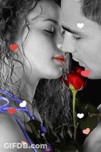 Man And Woman Kissing With Hearts GIF
