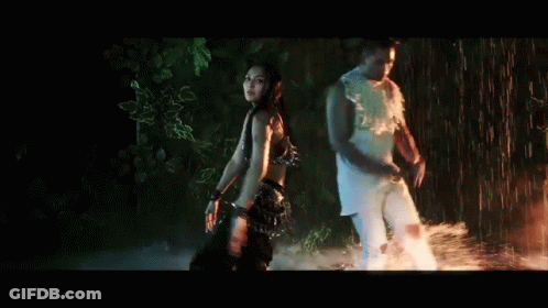 Man And Woman Kissing With Love Background GIF