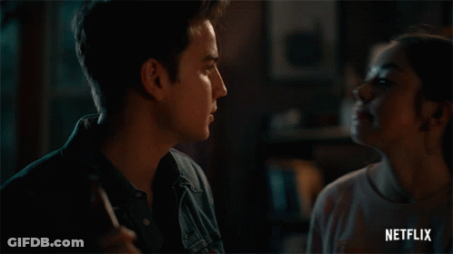Man And Woman Kissing With Netflix Logo GIF