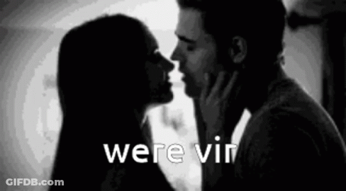Man And Woman Kissing With Were Vin GIF