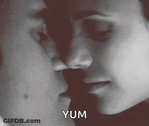 Man And Woman Kissing With Yum GIF