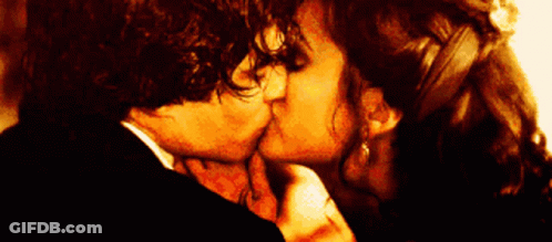 Man And Woman Kissing Woman Wearing Earrings GIF
