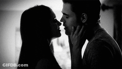 Man And Woman Kissing GIF
