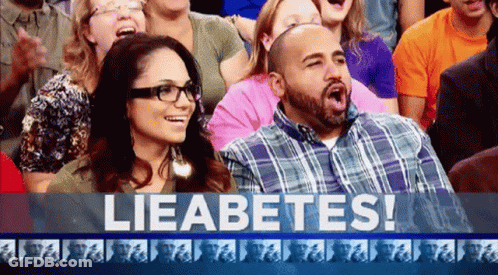 Man And Woman Laughing At Lieabetes Sign GIF