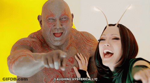 Man And Woman Laughing Hysterically Man Pointing GIF