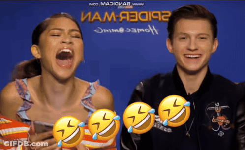 Man And Woman Laughing In Front Of Blue Background Saying Mod Maxxiiab GIF