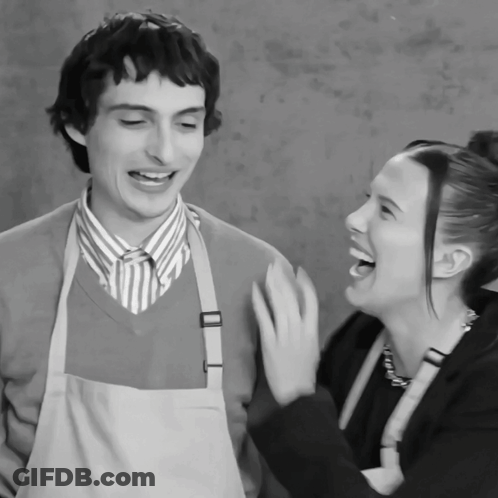 Man And Woman Laughing Together GIF