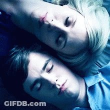 Man And Woman Laying Face Down Eyes Closed GIF