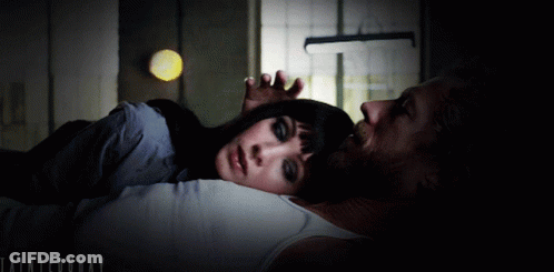 Man And Woman Laying On Bed Taintedgray GIF