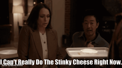 Man And Woman Looking At Cheese Tray Saying I Can't Really GIF