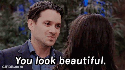 Man And Woman Looking At Each Other GIF