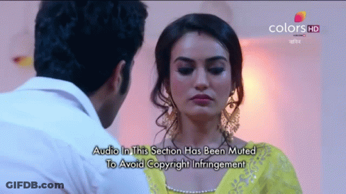 Man And Woman Looking At Each Other Audio Muted GIF