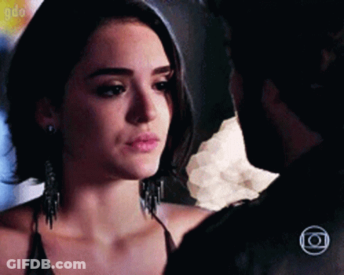 Man And Woman Looking At Each Other Close Up GIF