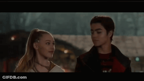 Man And Woman Looking At Each Other Dark Room GIF
