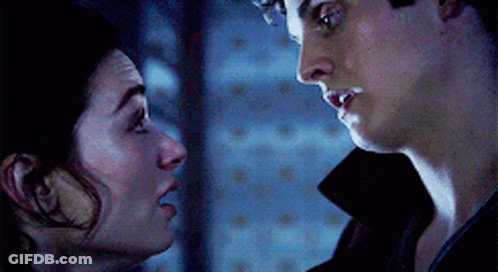 Man And Woman Looking At Each Other Eyes Closed GIF