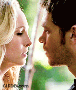 Man And Woman Looking At Each Other Eyes Closed GIF