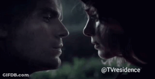 Man And Woman Looking At Each Other GIF