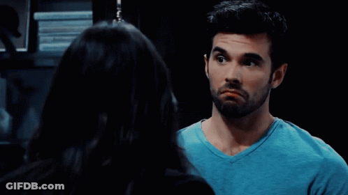 Man And Woman Looking At Each Other GIF