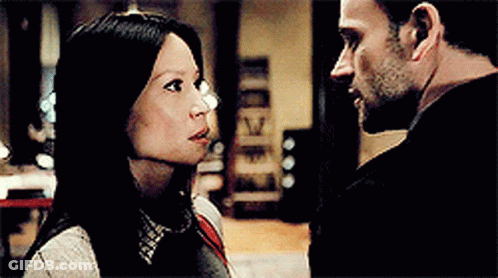 Man And Woman Looking At Each Other GIF