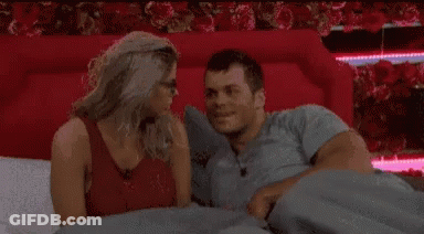 Man And Woman Looking At Each Other In Bed GIF