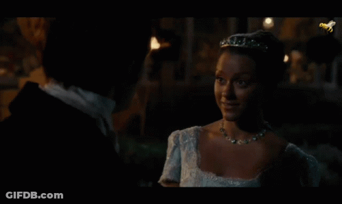 Man And Woman Looking At Each Other In Dark GIF