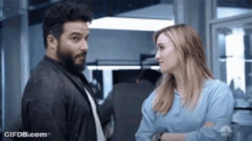 Man And Woman Looking At Each Other GIF