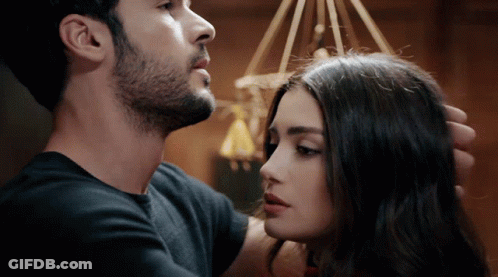 Man And Woman Looking At Each Other GIF
