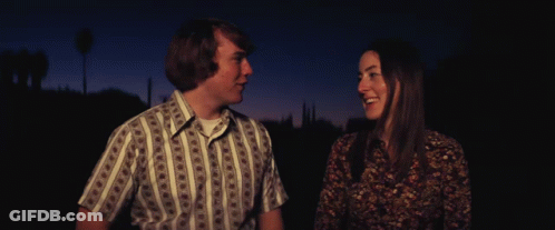 Man And Woman Looking At Each Other GIF
