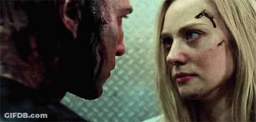Man And Woman Looking At Each Other GIF
