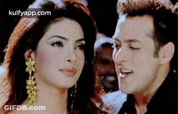 Man And Woman Looking At Each Other GIF