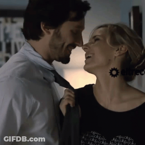 Man And Woman Looking At Each Other, Lucky Shirt GIF