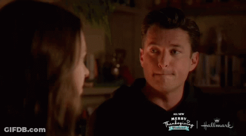 Man And Woman Looking At Each Other Merry Thanksgiving Hallmark GIF